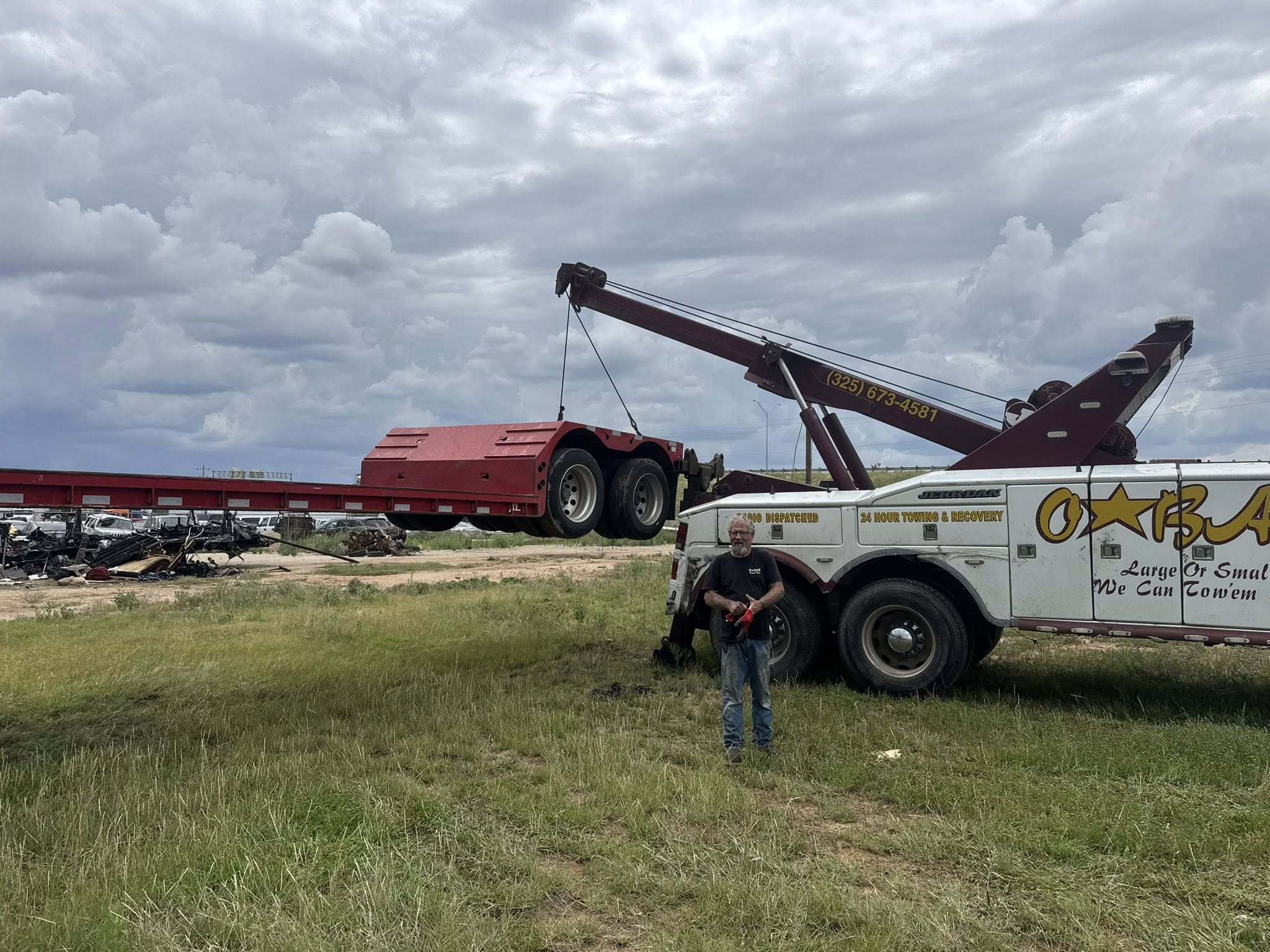 O'Bar wrecker recovering a trailer off-road